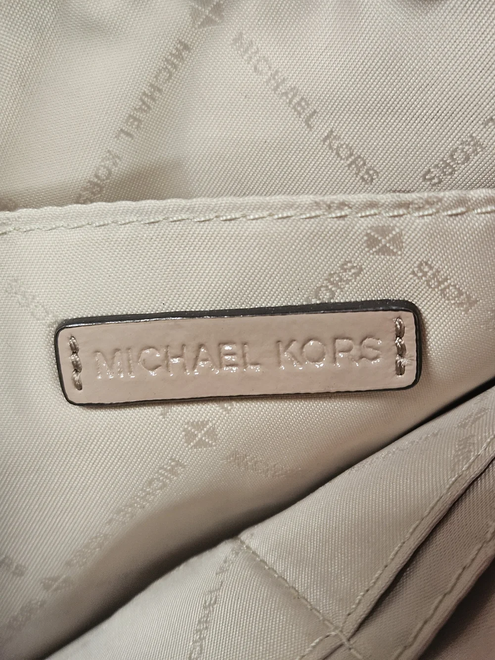 Michael Kors Blush Pink Embossed Wristlet Clutch with Gold